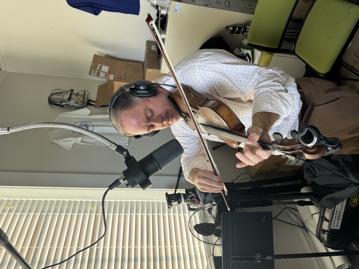 Calep Lewis recording violin in the studio